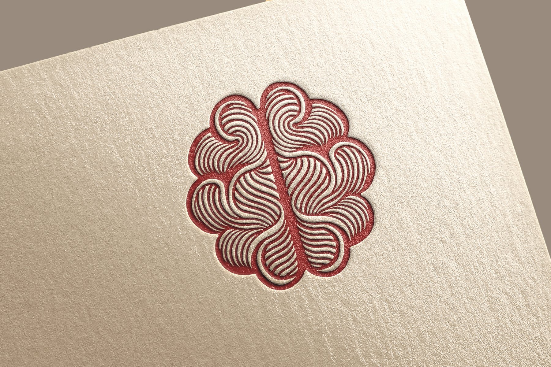 The Mauri mark letterpressed into heavy paper